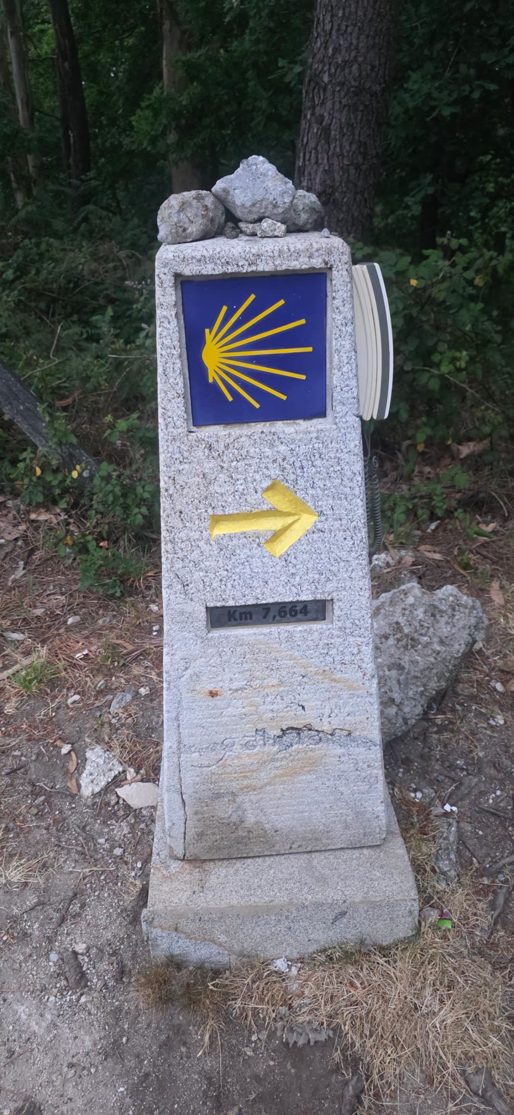 Camino waymarker reading Km 7,664